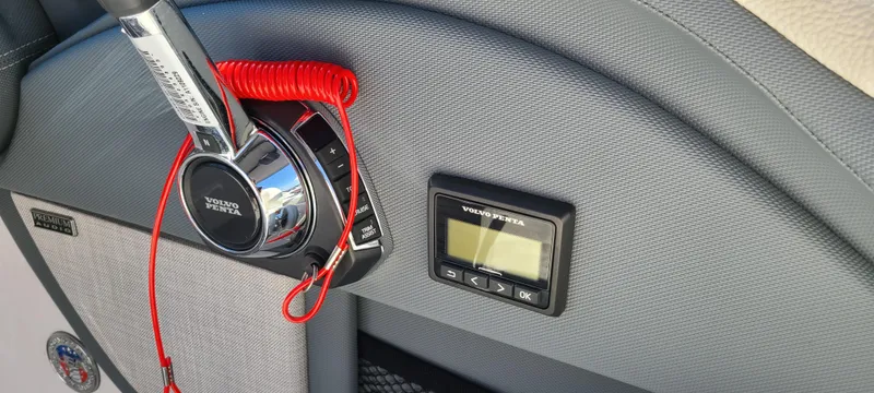 Slide: The Image of 2020 Cobalt R5 boat dashboard with Volvo Penta controls and display. - 38