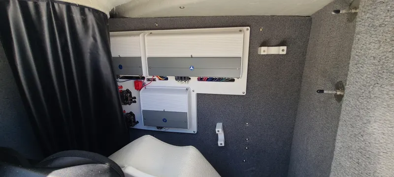 Slide: The Image of 2020 Cobalt R5 boat interior showing control panel and wiring. - 39