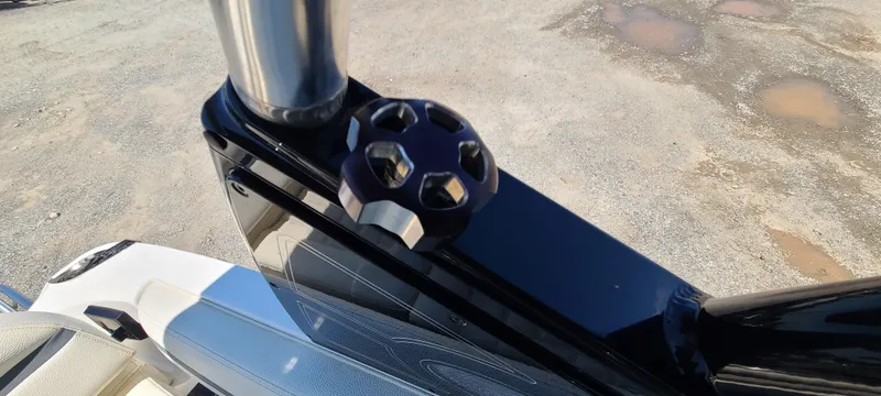 Slide: The Image of 2020 Cobalt R5 boat detail showing sleek black and silver hardware on deck. - 43