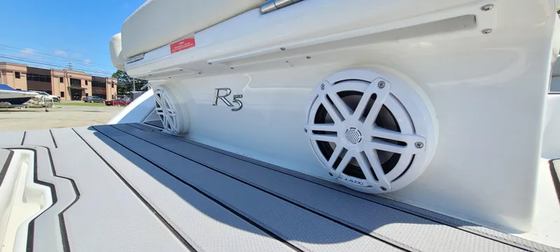 Slide: The Image of 2020 Cobalt R5 boat with speakers on deck, showcasing sleek design and premium features. - 9