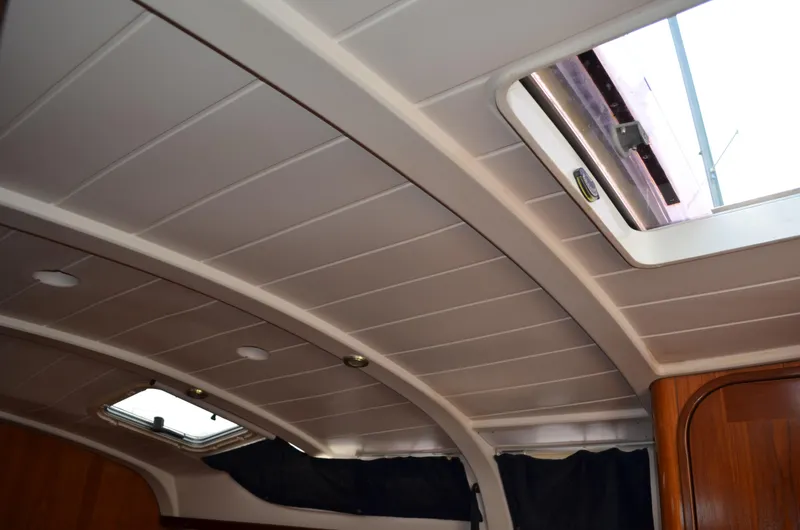Slide: The Image of Interior ceiling of a 1993 Beneteau Oceanis 370 sailboat with skylights. - 18
