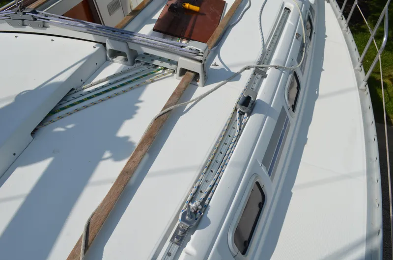 Slide: The Image of Deck of 1993 Beneteau Oceanis 370 sailboat with rigging and hatches. - 7