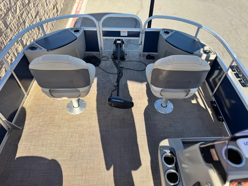 Slide: The Image of 2023 Sun Tracker Bass Buggy 18 DLX pontoon boat interior with two swivel seats. - 11