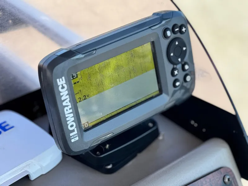 Slide: The Image of Fish finder on 2023 Sun Tracker Bass Buggy 18 DLX boat dashboard. - 23