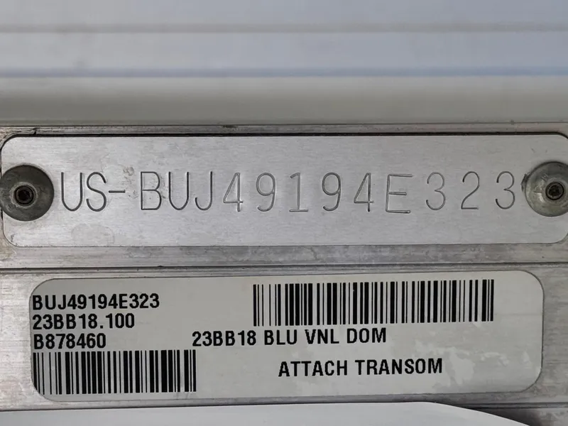Slide: The Image of 2023 Sun Tracker Bass Buggy 18 DLX identification plate with serial number and barcodes. - 26