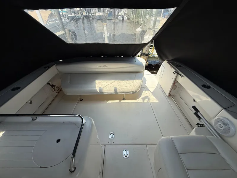Slide: The Image of Interior view of 2006 Sea Ray 290 Amberjack boat with seating and covered deck. - 4