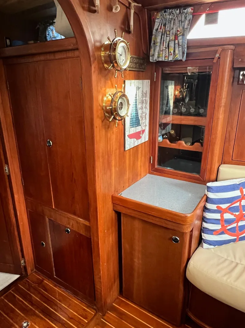Slide: The Image of Interior of 1992 Endeavour 45 yacht with wooden cabinetry and nautical decor. - 27