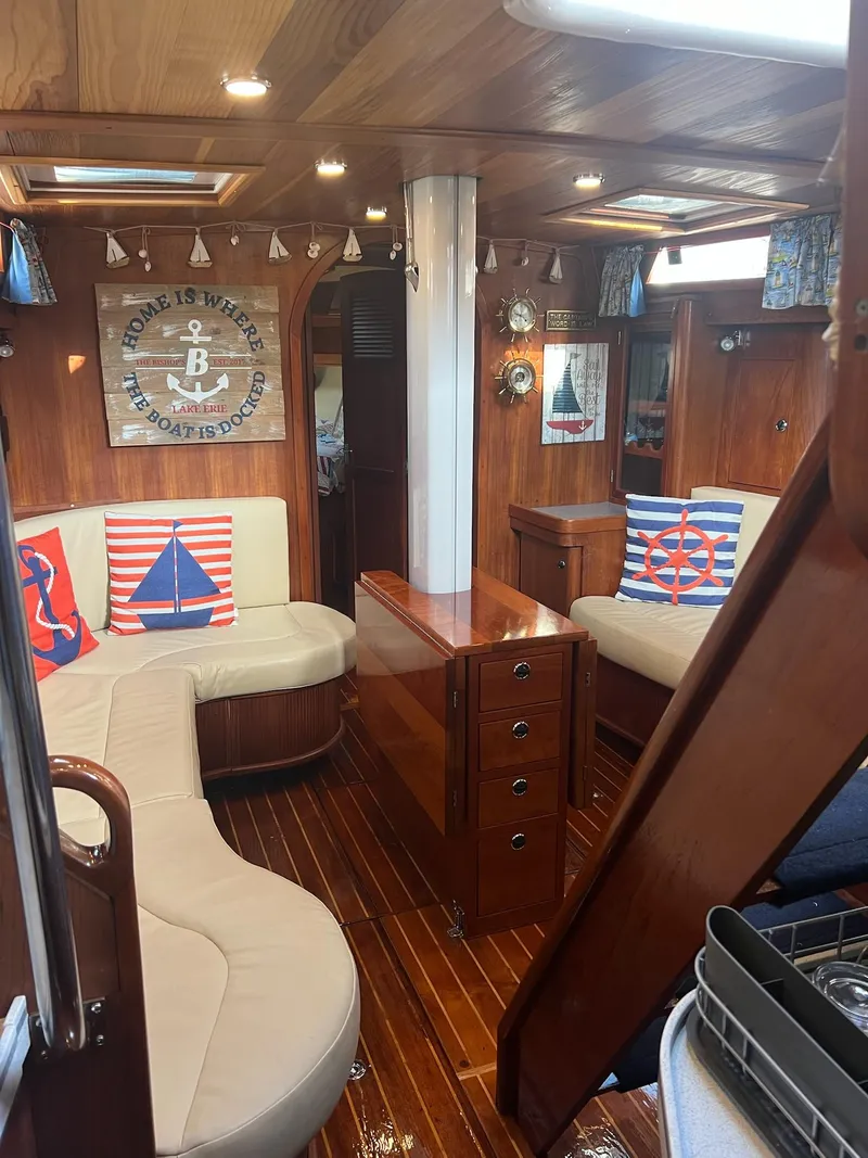 Slide: The Image of Cozy interior of 1992 Endeavour 45 sailboat with nautical decor and wooden furnishings. - 32