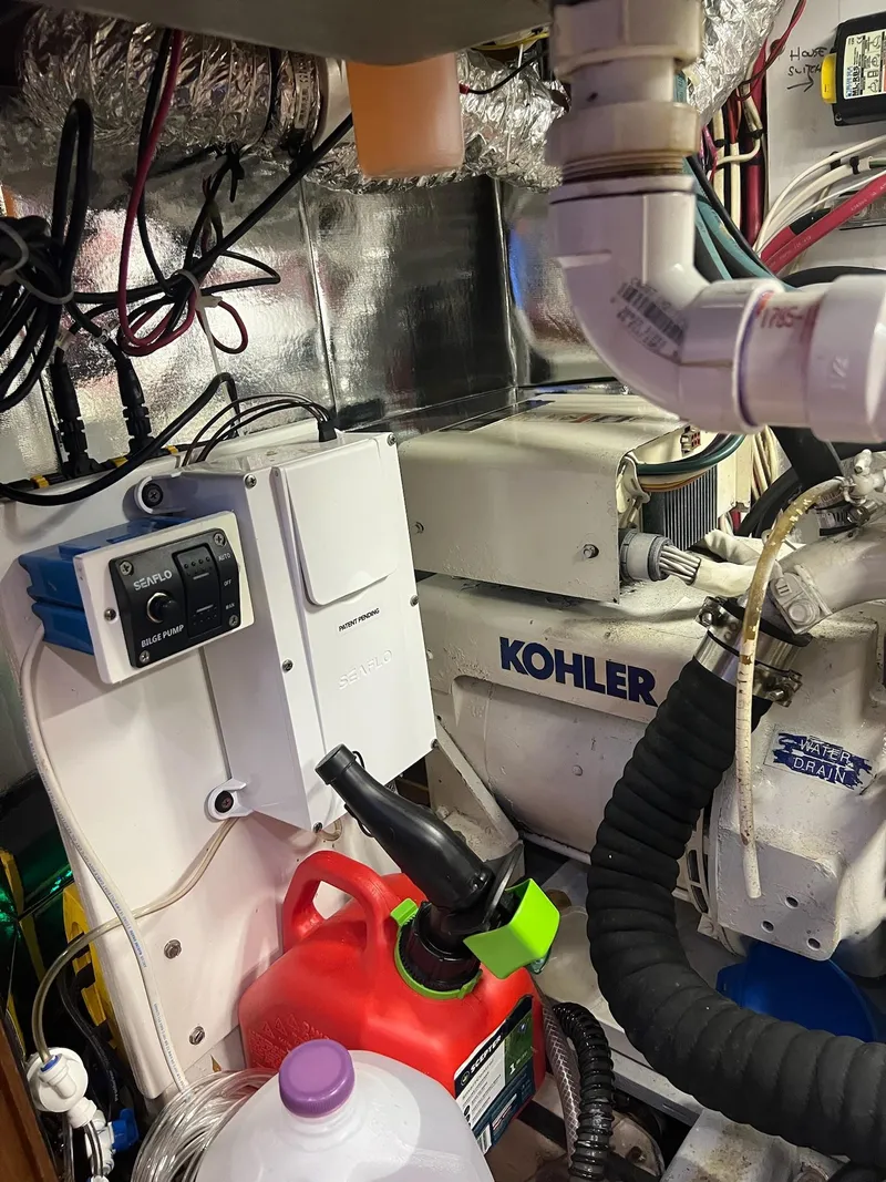 Slide: The Image of Engine room of 1992 Endeavour 45 yacht with Kohler generator and Seaflo bilge pump. - 39