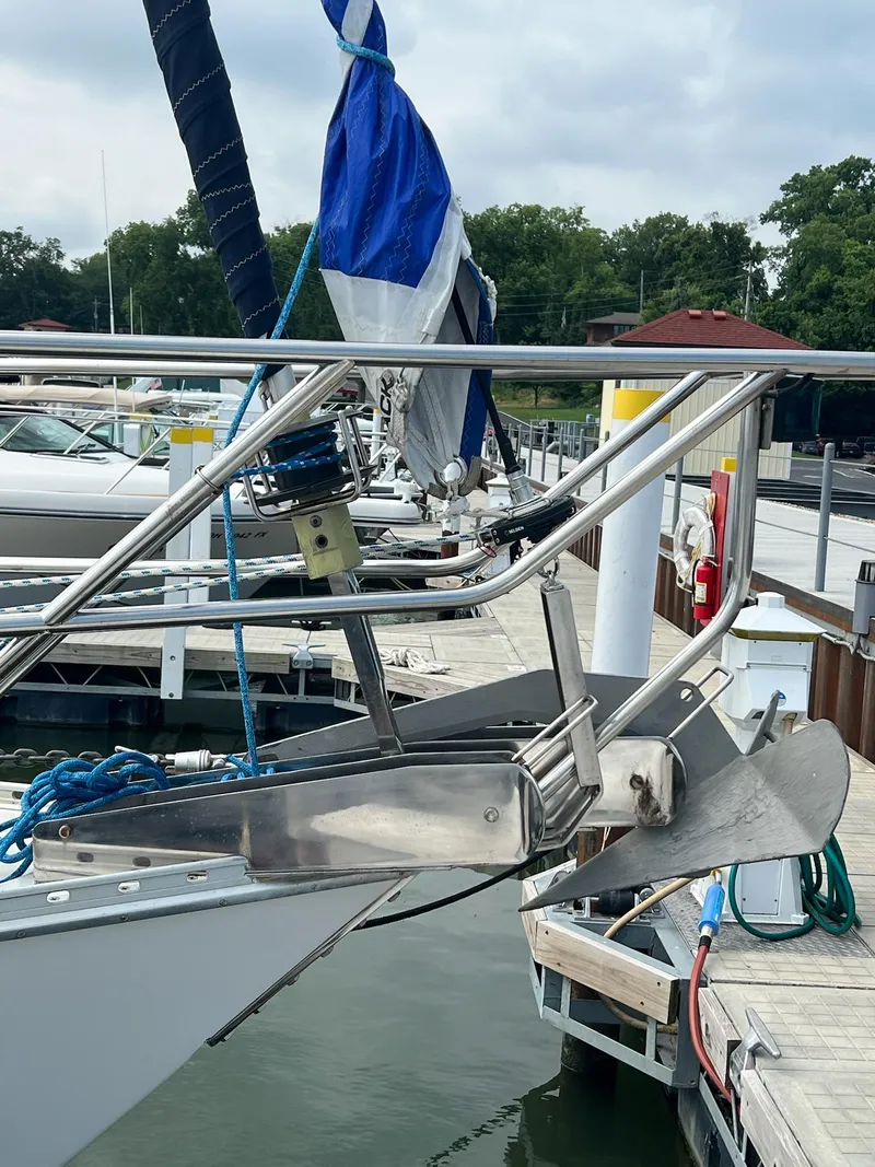 Slide: The Image of Bow of 1992 Endeavour 45 sailboat with anchor and docked at marina. - 8