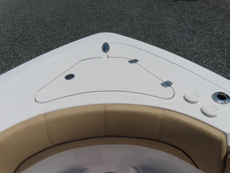 Slide: The Image of 2018 Sportsman Heritage 251 Center Console bow seating with storage compartment. - 17