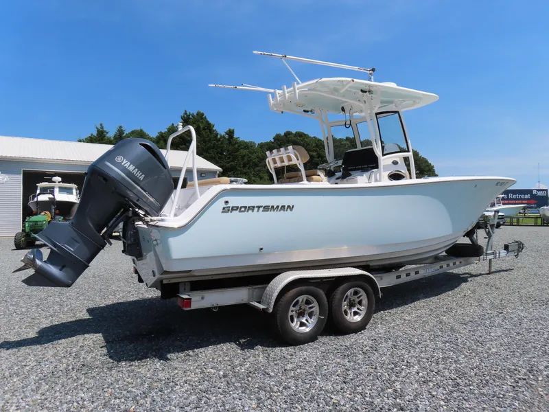 Slide: The Image of 2018 Sportsman Heritage 251 Center Console boat on trailer, featuring Yamaha outboard motor. - 3