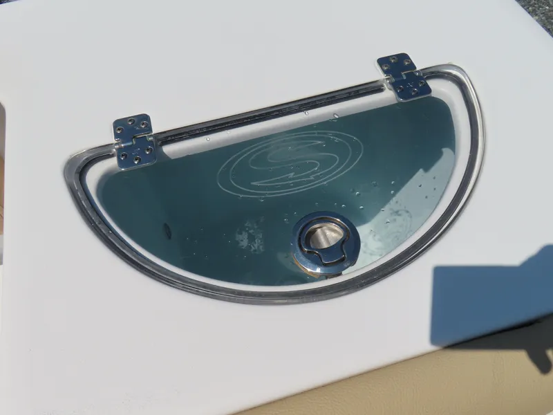 Slide: The Image of Hinged compartment on 2018 Sportsman Heritage 251 Center Console boat. - 42