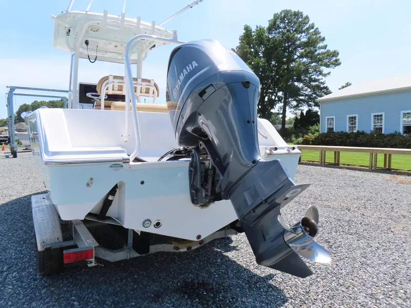 Slide: The Image of 2018 Sportsman Heritage 251 Center Console boat with Yamaha outboard motor on trailer. - 5