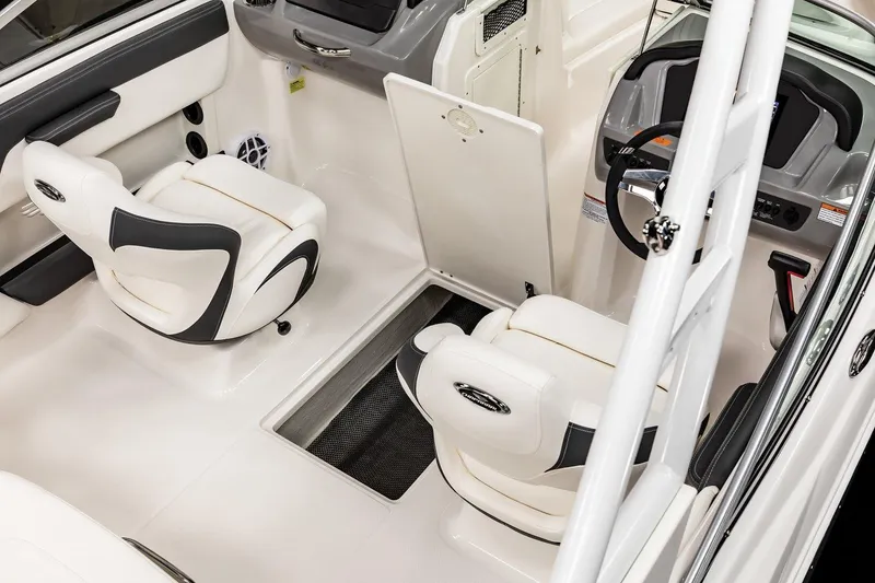 Slide: The Image of Interior of 2026 Chaparral 21 SSi Ski & Fish OB boat, featuring sleek seating and modern controls. - 11