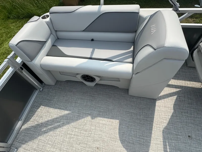 Slide: The Image of Luxurious seating on 2025 Avalon Venture QL pontoon boat, featuring sleek gray upholstery. - 10