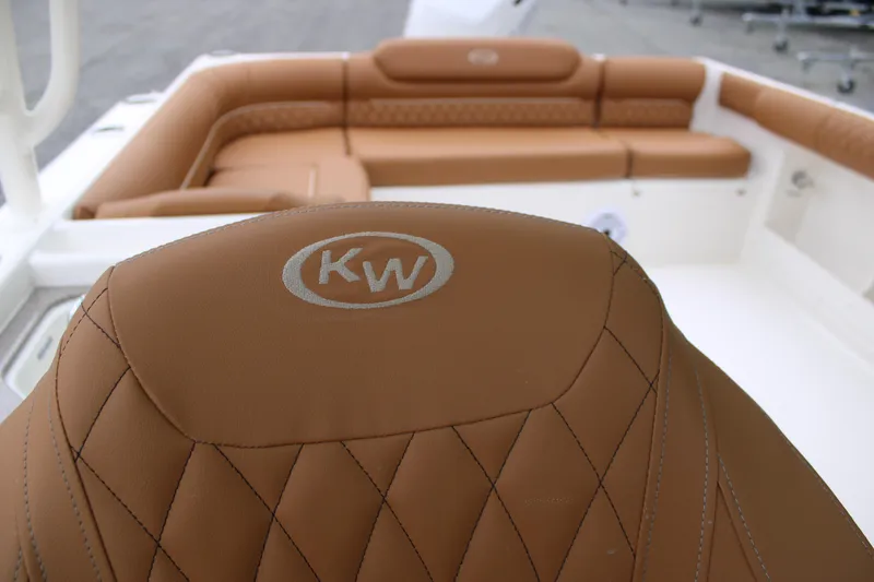 Slide: The Image of Luxurious interior of 2026 Key West 239 DFS boat with tan leather seating. - 13