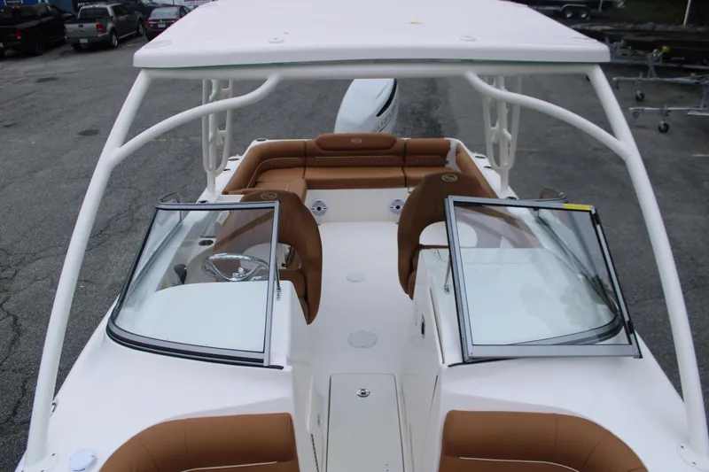 Slide: The Image of 2026 Key West 239 DFS boat with brown seating and dual consoles, viewed from above. - 16