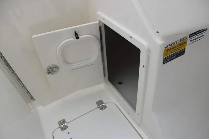 Slide: The Image of 2026 Key West 239 DFS boat interior storage compartment with capacity label. - 22