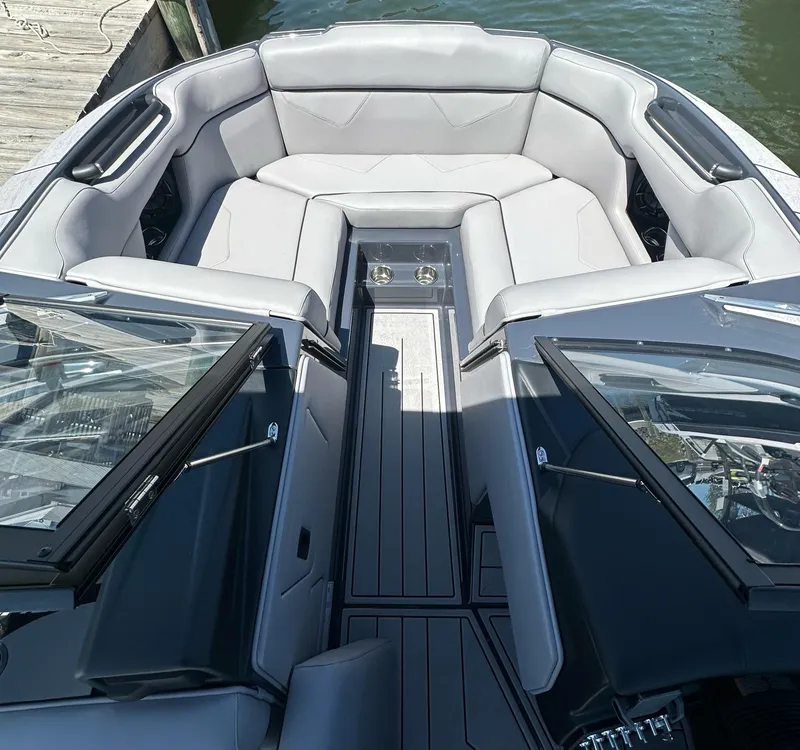 Slide: The Image of 2024 Moomba Kaiyen boat interior with sleek gray seating and modern design. - 10