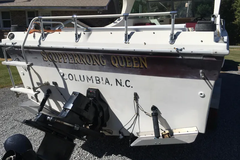 Slide: The Image of 1976 Sport-Craft 25 boat named "Scuppernong Queen" in Columbia, N.C., rear view. - 10