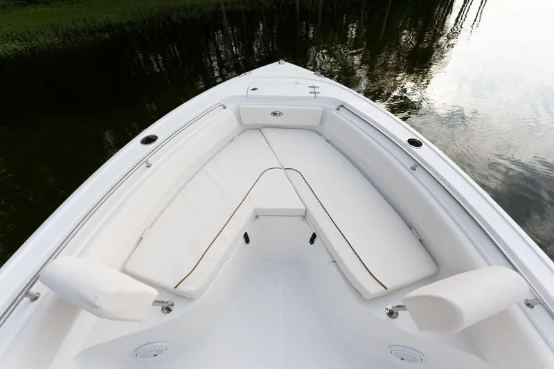 Slide: The Image of 2024 Sea Hunt Ultra 239 SE boat bow seating area. - 12