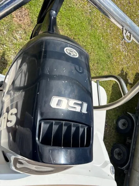 Slide: The Image of Outboard motor on a 2022 Hurricane SS 205 OB boat, viewed from above. - 18