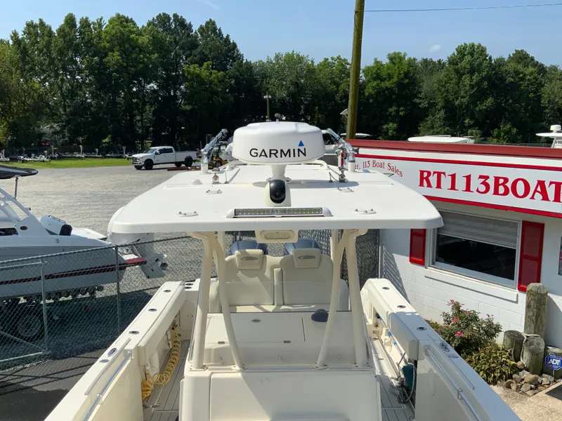 Slide: The Image of 2013 Cobia 296 Center Console boat with Garmin equipment at RT113 Boat Sales. - 27