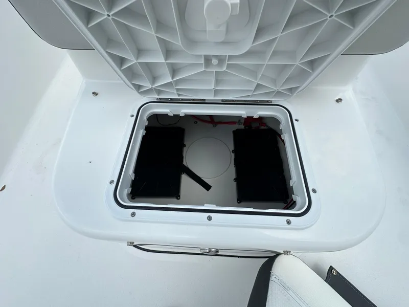 Slide: The Image of 2026 Sea Pro 172 Bay boat storage compartment with open hatch. - 8