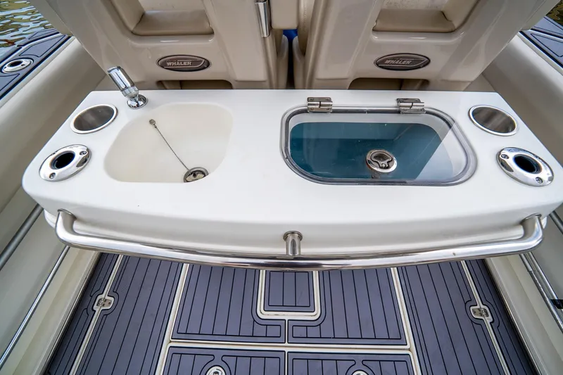 Slide: The Image of 2018 Boston Whaler 280 Outrage boat sink and livewell on deck. - 34