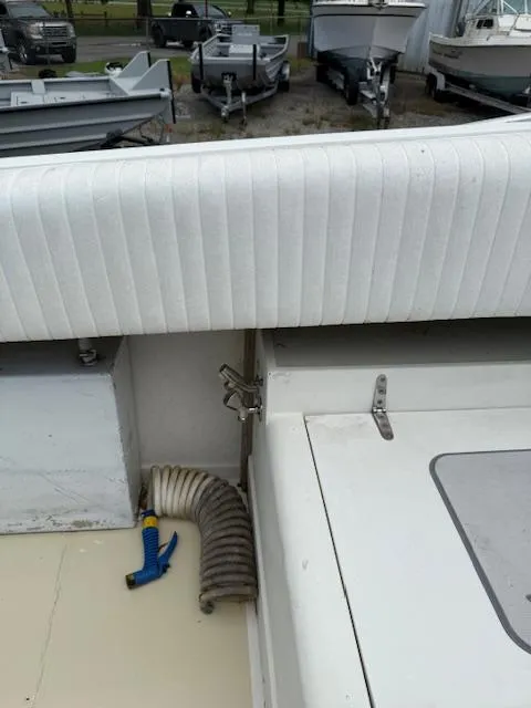 Slide: The Image of 1986 Blackfin 27 boat interior with white upholstery and equipment. - 4