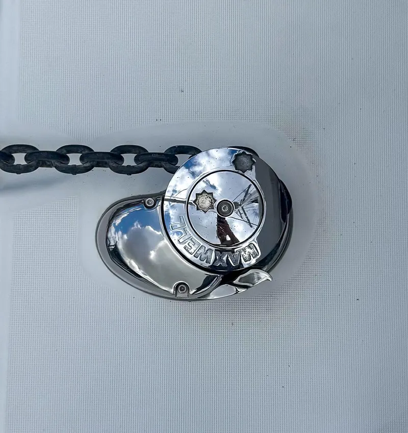 Slide: The Image of Chrome anchor windlass on 2011 Lagoon 400 yacht deck. - 51