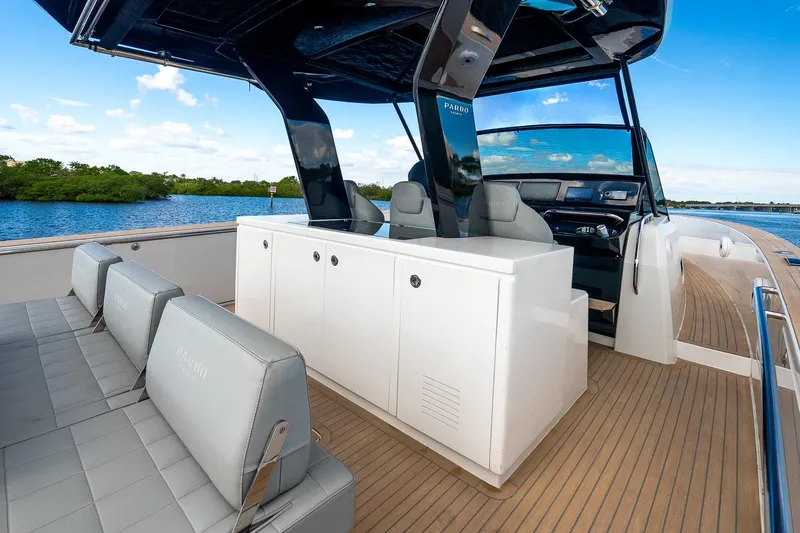 Slide: The Image of Luxurious 2024 Pardo Yachts 43 with sleek seating and modern helm on open water. - 24