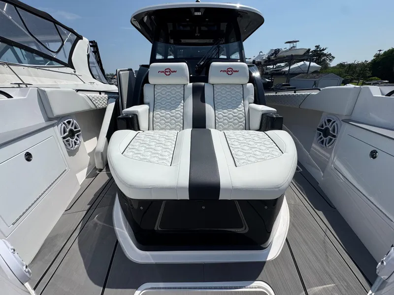 Slide: The Image of 2025 Fountain 43 SCX boat interior with luxurious seating and modern design. - 14