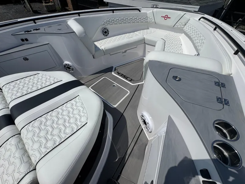 Slide: The Image of Luxurious interior of 2025 Fountain 43 SCX boat with plush seating and modern design. - 15