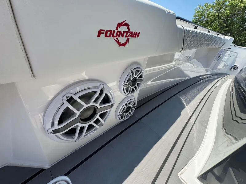 Slide: The Image of 2025 Fountain 43 SCX boat with sleek design and integrated speakers. - 18