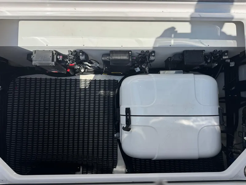 Slide: The Image of 2025 Fountain 43 SCX boat compartment with equipment and storage box. - 19