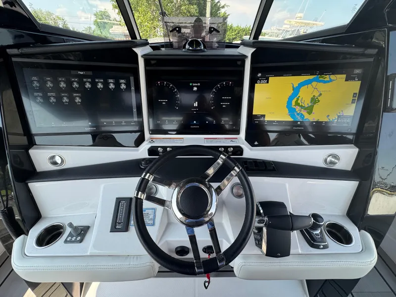 Slide: The Image of Cockpit of 2025 Fountain 43 SCX with advanced navigation displays and controls. - 5