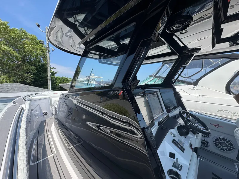 Slide: The Image of 2025 Fountain 43 SCX boat cockpit with modern controls and sleek design. - 8
