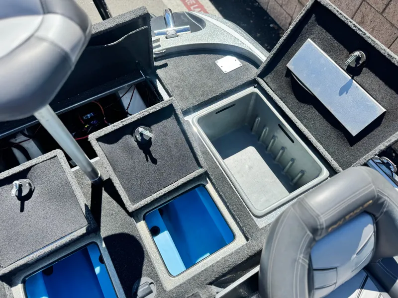 Slide: The Image of 2017 Tracker Nitro Z19 boat storage compartments and seating area. - 21
