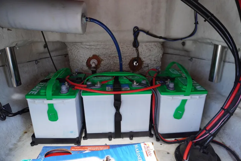 Slide: The Image of Batteries installed in a 2014 NauticStar 244 XTS boat, showcasing wiring and connections. - 20