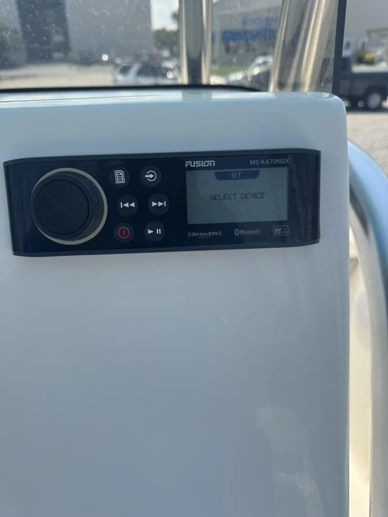 Slide: The Image of Fusion MS-RA70NSX stereo system on 2023 Key West 219 FS boat dashboard. - 5
