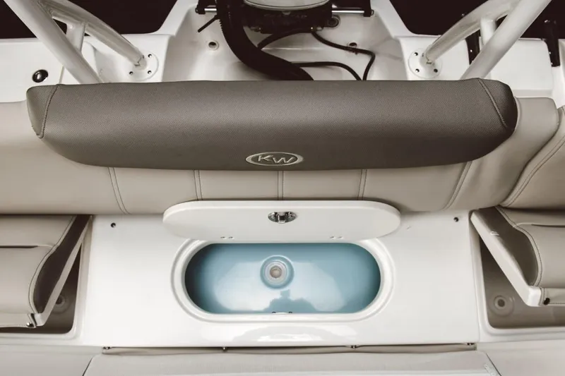 Slide: The Image of 2023 Key West 219 FS boat interior with seating and storage compartment. - 8