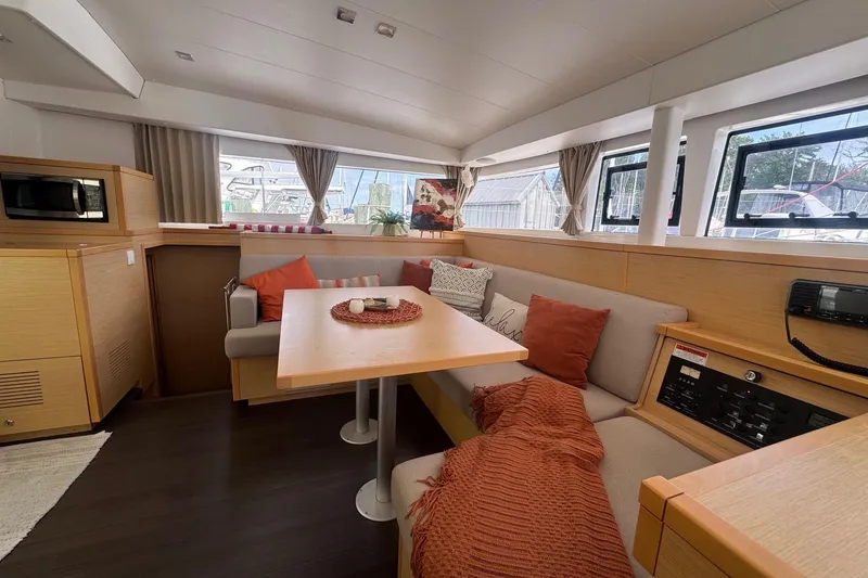 Slide: The Image of Interior of 2016 Lagoon 400 S2 catamaran with cozy seating and modern amenities. - 33