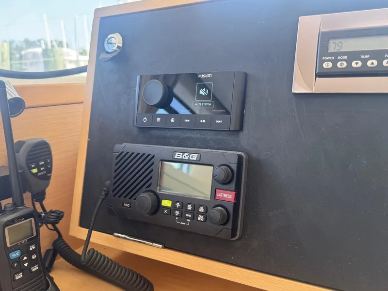 Slide: The Image of Control panel of a 2016 Lagoon 400 S2 yacht with communication devices. - 39