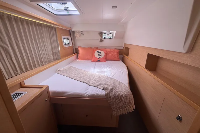 Slide: The Image of Cozy bedroom in 2016 Lagoon 400 S2 yacht with natural wood finish. - 44