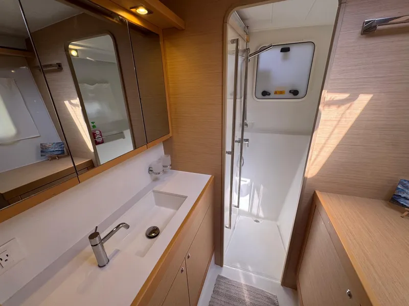 Slide: The Image of Modern bathroom interior of 2016 Lagoon 400 S2 yacht with sleek design and ample lighting. - 47