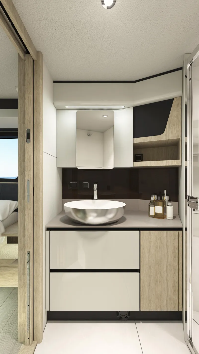 Slide: The Image of Modern bathroom in 2024 Absolute 48 Coupe yacht with sleek vanity and mirror. - 15