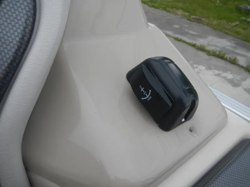 Slide: The Image of Boat control panel with anchor switch on a 2010 Crest III. - 10