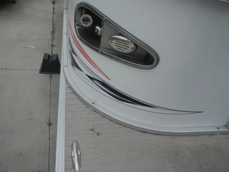 Slide: The Image of 2010 Crest Crest III boat with sleek design and modern detailing. - 13